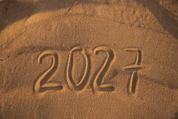 2027 Drawn on Sand in Summer, new year numbers
