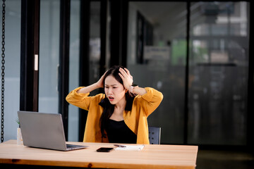 Angry young woman arguing with businessman in casual meeting at café, frustrated over contract, debt, or financial problem indoors.
