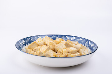 The home-cooked dish stir-fried tofu on the plate