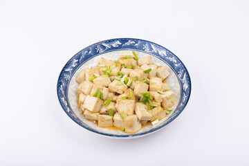 The home-cooked dish stir-fried tofu on the plate
