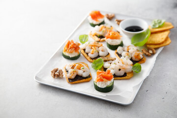 Assorted appetizers with shrimps and salmon
