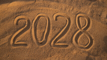 2028 Drawn on Sand in Summer, new year numbers