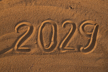 2029 Drawn on Sand in Summer, new year numbers