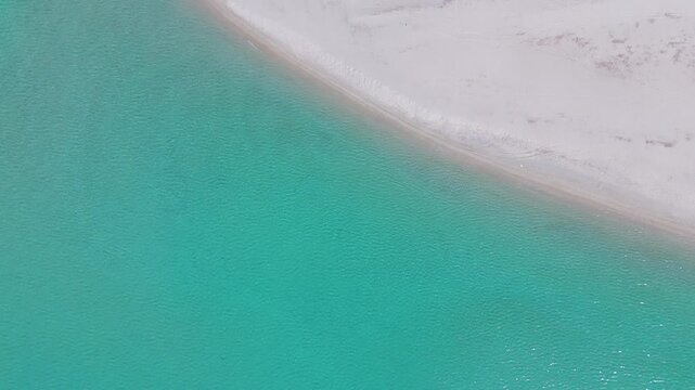Aerial Drone Shot Over Possidi Beach And Clear Turquoise Aegean Sea, Kassandra Peninsula, Halkidiki, Greece, Early Morning.