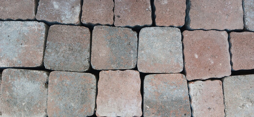 Stone pavement texture with old bricks