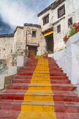 Monastery in Tibet, pilgrimage, bark. Om Mani Padme Hum. Religion and culture of Tibet. Tourism, journey to self, mystery, mysticism, yoga, meditation, spiritual journey, stairs in a monastery