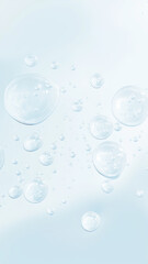 Clear transparent water bubble cluster floating on pale blue background, bright fresh and calm atmosphere