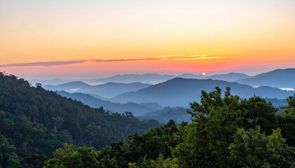 Obraz premium Panoramic Sunrise Vista Over Lush Green Mountain Range