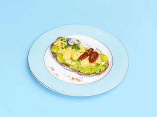 Open sandwich with avocado and egg