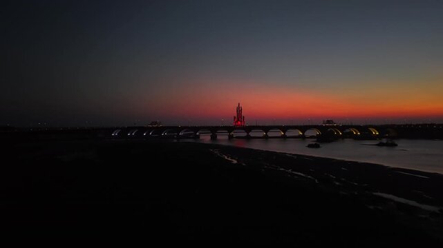 Aerial view of the Pandansimo Bridge at sunset, Bantul, Yogyakarta, as part of the southern ring road route of Java.