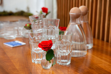 Elegant glassware and rose arrangement