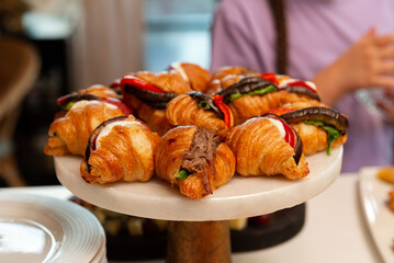 Gourmet croissant sandwiches display