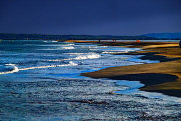 Waves in Port La Nouvelle in the South of France. Mediterranean beach at the end of the day in the...