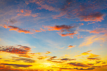 Fototapeta premium Morning cloud and sky background texture,colorful clouds and sky,Dusk, Sunset Sky Clouds in the Evening with colorful Orange, Yellow, Pink and red sunlight and Dramatic storm clouds on Twilight sky.