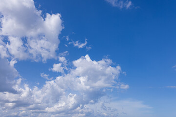 Clouds and sky during the day,clear blue sky with thick white clouds during the day. Sky background.
