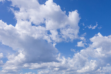 Clouds and sky during the day,clear blue sky with thick white clouds during the day. Sky background.
