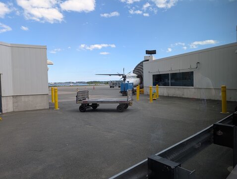 A taxied propeller plane in Billy Bishop, Toronto City airport, Canada - August 2025