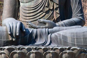 hands and legs of the large Buddha statue at the temple