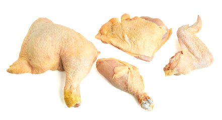 Assortment of raw chicken cuts with breast thigh drumstick and wing ready for recipes isolated on white background

