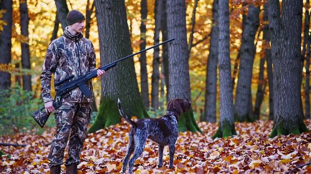 Autumn Hunting Young Man with German Wirehaired Pointer Dog Best Friends
