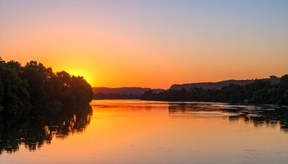 Obraz premium Sunrise River Landscape with Golden Hour.