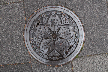 manhole cover in tokyo in japan 