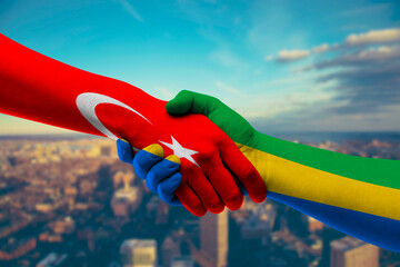 Shaking hands Turkey and Gabon