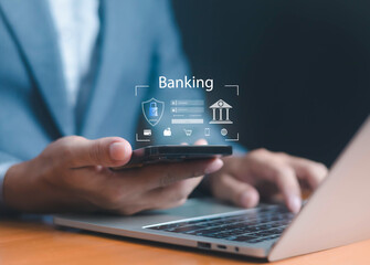 Person using smartphone and laptop with online banking interface, symbolizing mobile banking, fintech innovation, secure digital finance, e-payment, money transfer, account management, and financial.
