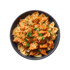 Delicious Creamy Tomato Chicken Pasta in a Dark Bowl - Overhead Shot