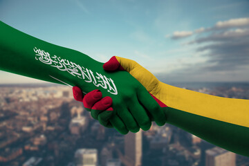 Shaking hands Saudi Arabia and Guinea-Bissau