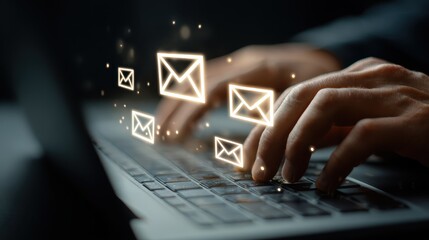 Hands typing email messages on laptop glowing icons digital communication