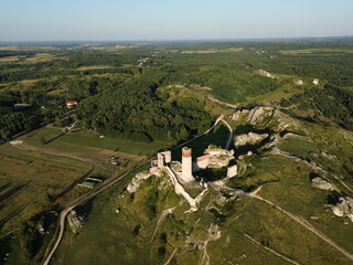 Golden hour drone flight over Olsztyn Castle, Poland