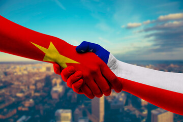Shaking hands Vietnam and Chile