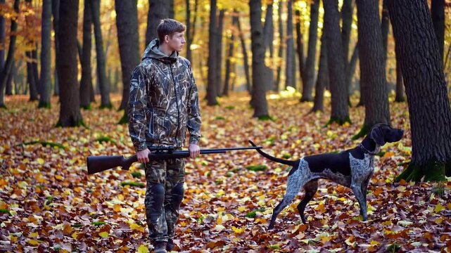 Autumn Hunting Young Man with German Wirehaired Pointer Dog Best Friends