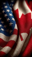 Flags of Canada and the United States intertwined represent friendship and unity between nations