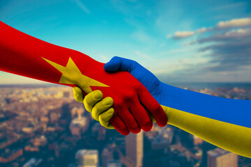 Shaking hands Vietnam and Ukraine