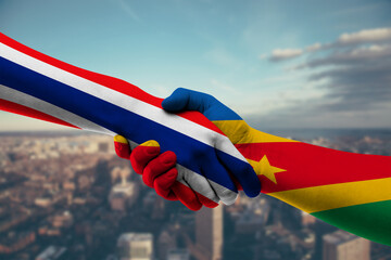 Shaking hands Thailand and Congo