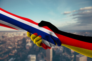 Shaking hands Thailand and Germany