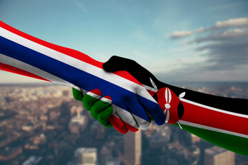 Shaking hands Thailand and Kenya