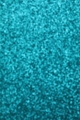 Abstract blurred shiny turquoisу glitter texture background