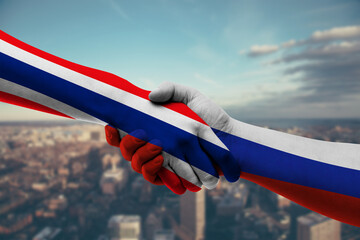 Shaking hands Thailand and Russia