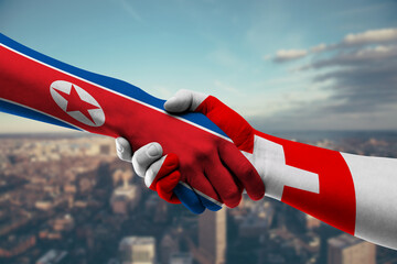 Shaking hands Northkorea and_Switzerland