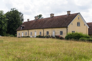 Obraz premium country road in a village in Sweden