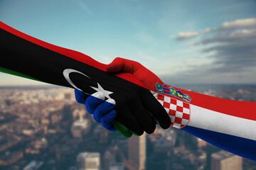Shaking hands Libya and Croatia