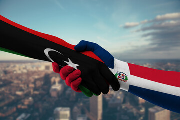Shaking hands Libya and Dominican Republic