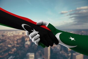 Shaking hands Libya and Pakistan