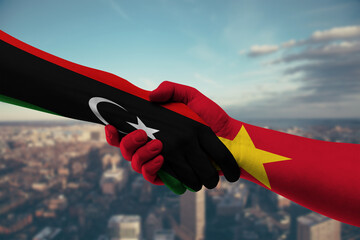 Shaking hands Libya and Vietnam