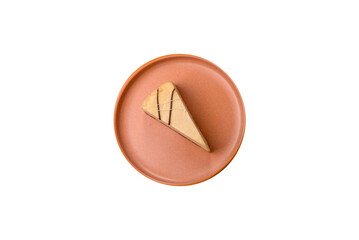 A piece of sweet New York cheesecake, dessert, cheese and vanilla pie. Classic cheesecake