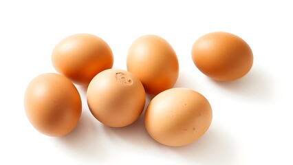 Fresh brown eggs on a white background, emphasizing simplicity and natural food.