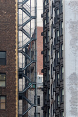Fototapeta premium Exterior fire escape on historic New York City building 